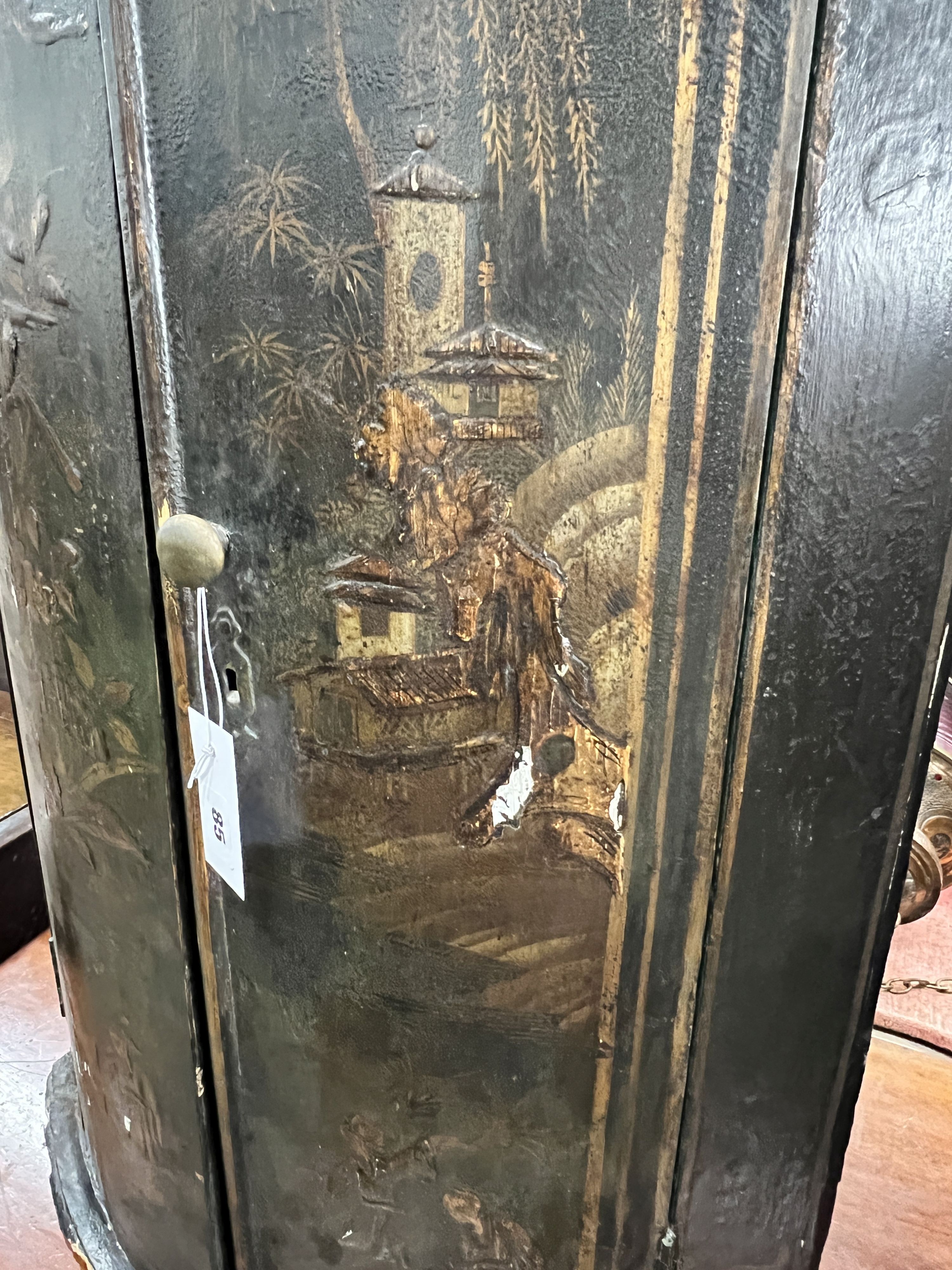 A 19th century chinoiserie lacquer bowfront hanging corner cabinet, width 56cm, depth 34cm, height 91cm